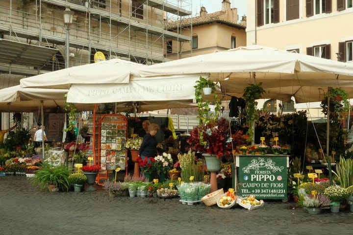 A vibrant spread of seasonal Italian ingredients, including fresh vegetables, herbs, and pasta, showcasing the essence of Italian cooking.