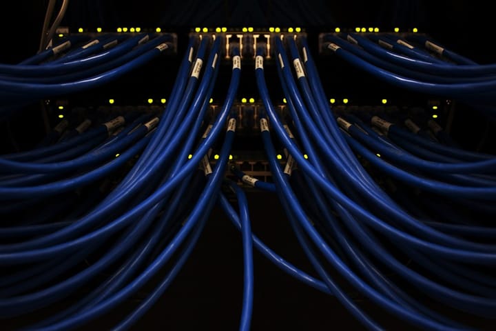 A server room filled with high-performance computing equipment, illustrating the growing demand for AI power and energy consumption.